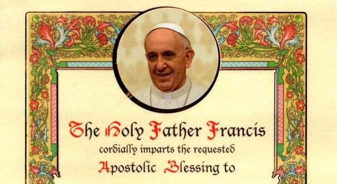 A picture of Pope Francis on a piece of parchement with an elaborate floral border